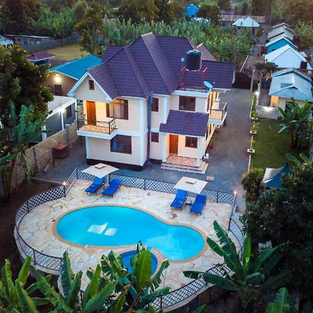 Rayan Apartments & Safaris Arusha Esterno foto