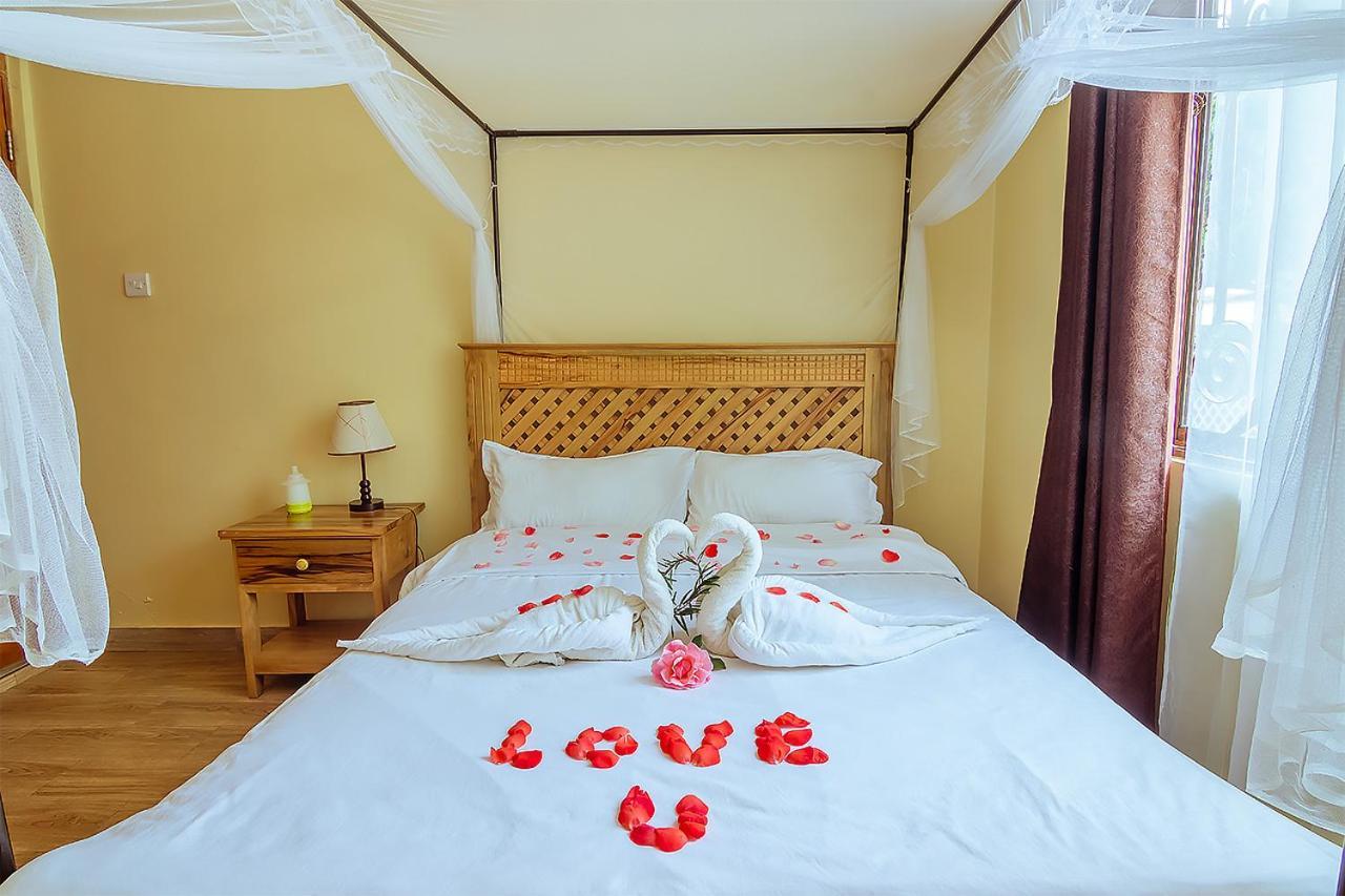 Rayan Apartments & Safaris Arusha Esterno foto
