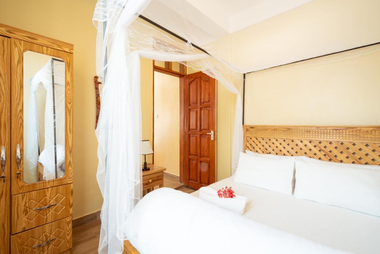 Rayan Apartments & Safaris Arusha Esterno foto